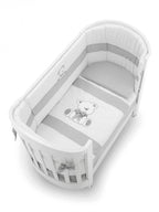 Bas ovaal babybed met grijs textiel
