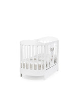Saar ovaal babybed in wit, zijaanzicht