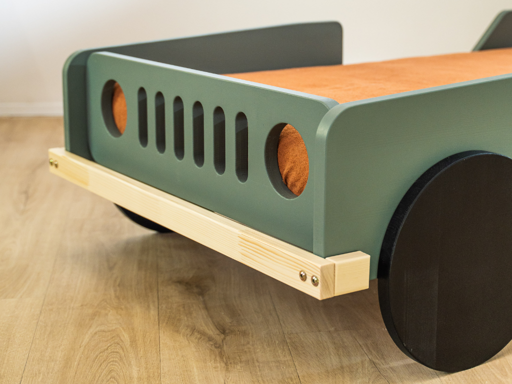 Scout autobed, detail van de uitgefreesde grille en de koplamp