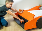 Turbo GT autobed in oranje, open vak onder de neus